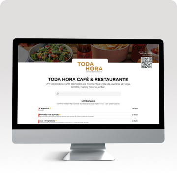 A monitor displays an example of a digital menu, from the fictional restaurant Toda Hora.